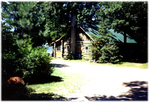 Sunsets and Sandcastles - Log Cabin